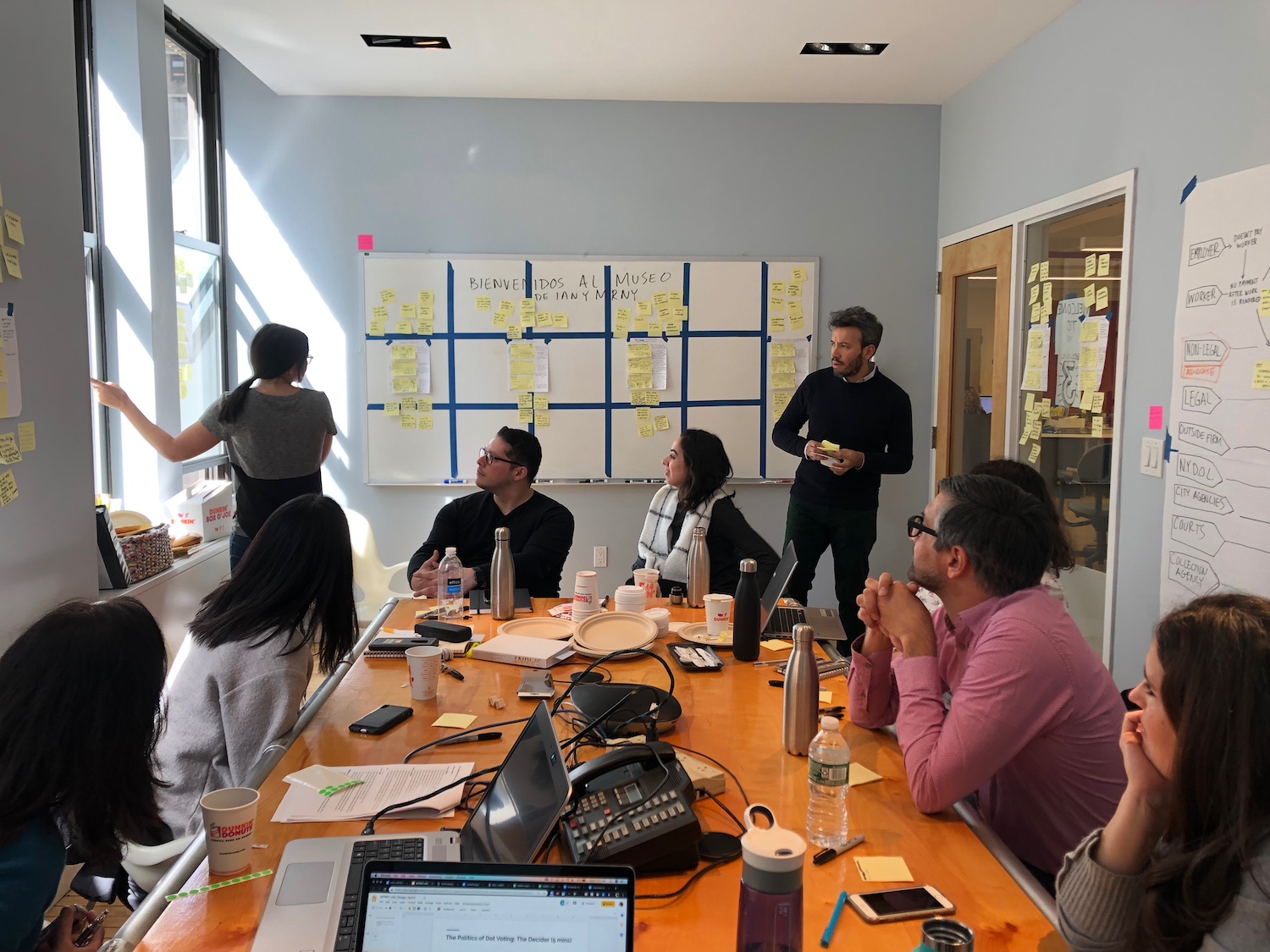 The team behind Reclamo in a design meeting when they were developing the Reclamo app to fight wage theft