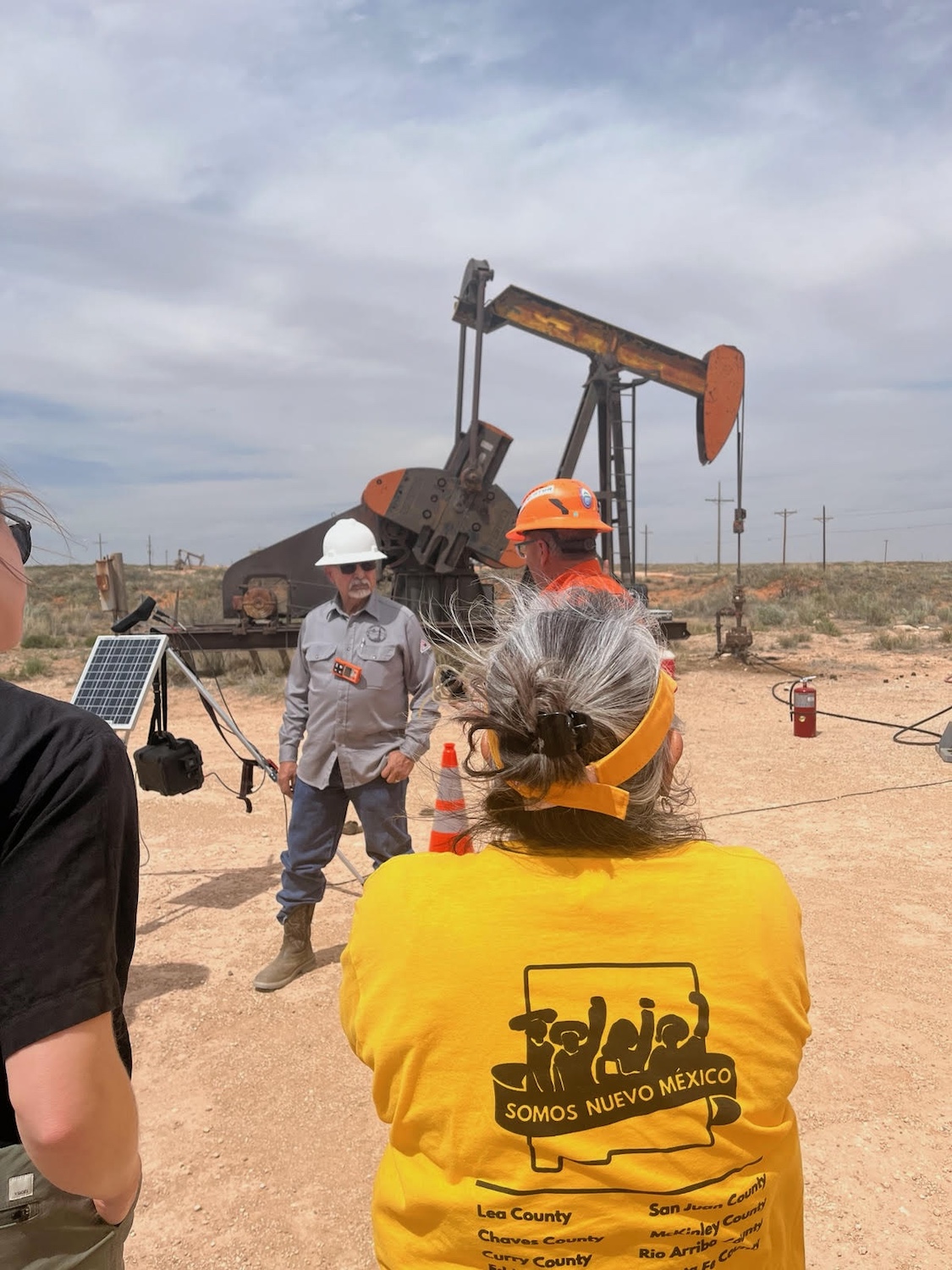 A Somos un Pueblo Unido member at an oil field - - oil and gas workers organizing for rights