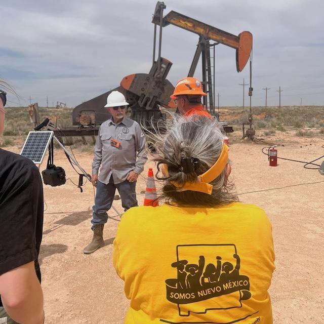 A Somos un Pueblo Unido member at an oil field. 