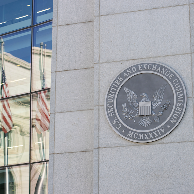 US Securities and Exchange Commission SEC — sign on headquarters with american flags