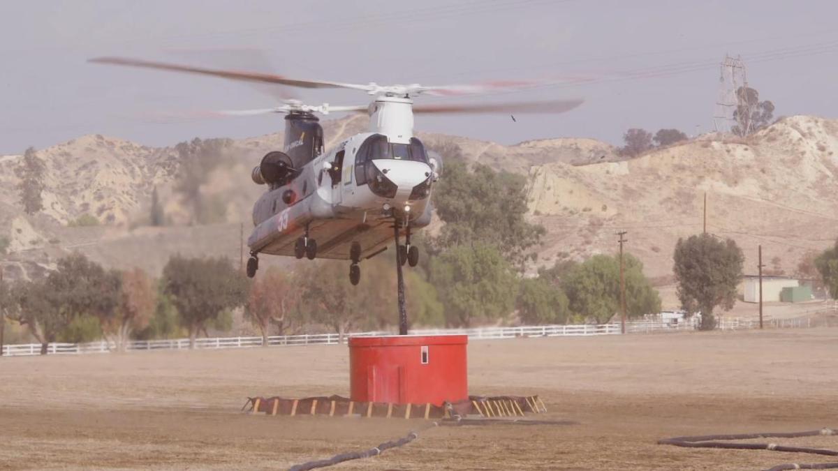 Each CH-47 helitanker can drop 3,000-gallon payloads of water or fire retardant and fill their tanks with a retractable snorkel while hovering, allowing for a faster return to the fire line.
