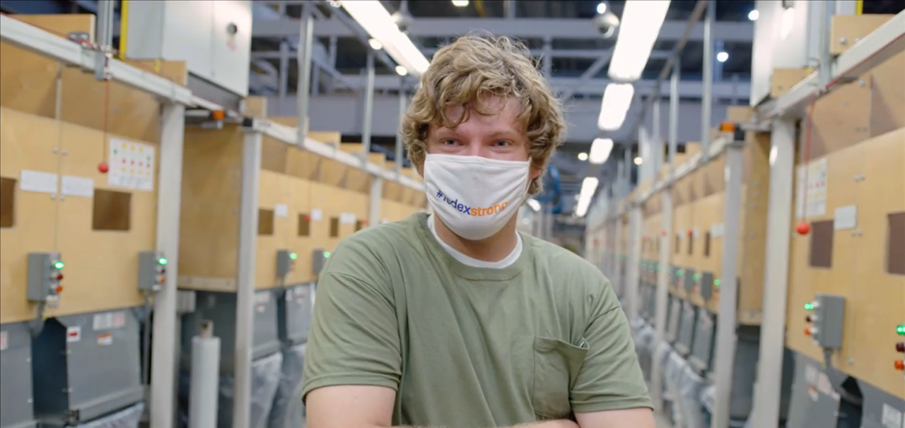 FedEx employee wearing mask