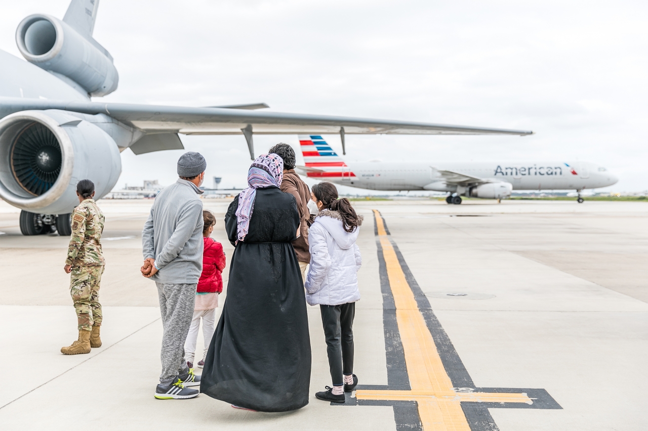 Family standing near plane