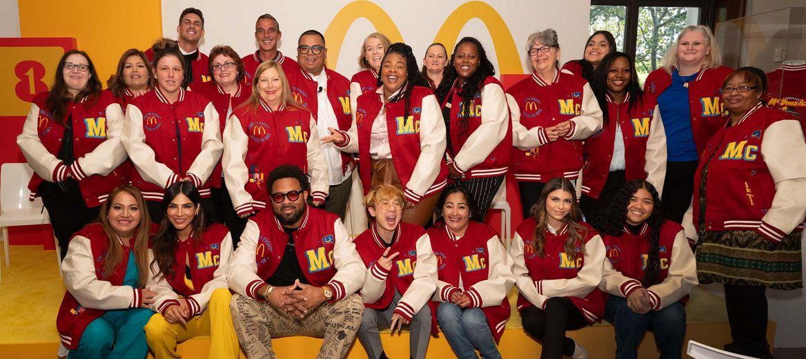 Group together wearing McDonald's letter jackets