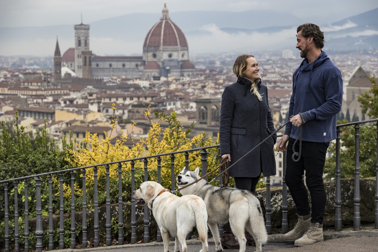 Steffi and husband with their dogs in Italy