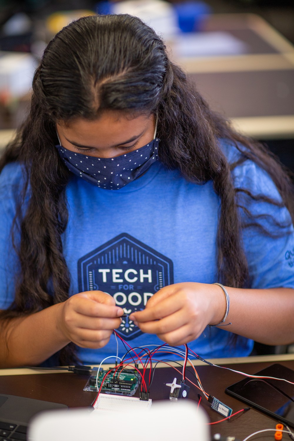 child working on a technology project