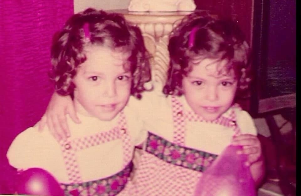 Wanda with her twin sister Yolanda, around the age of four