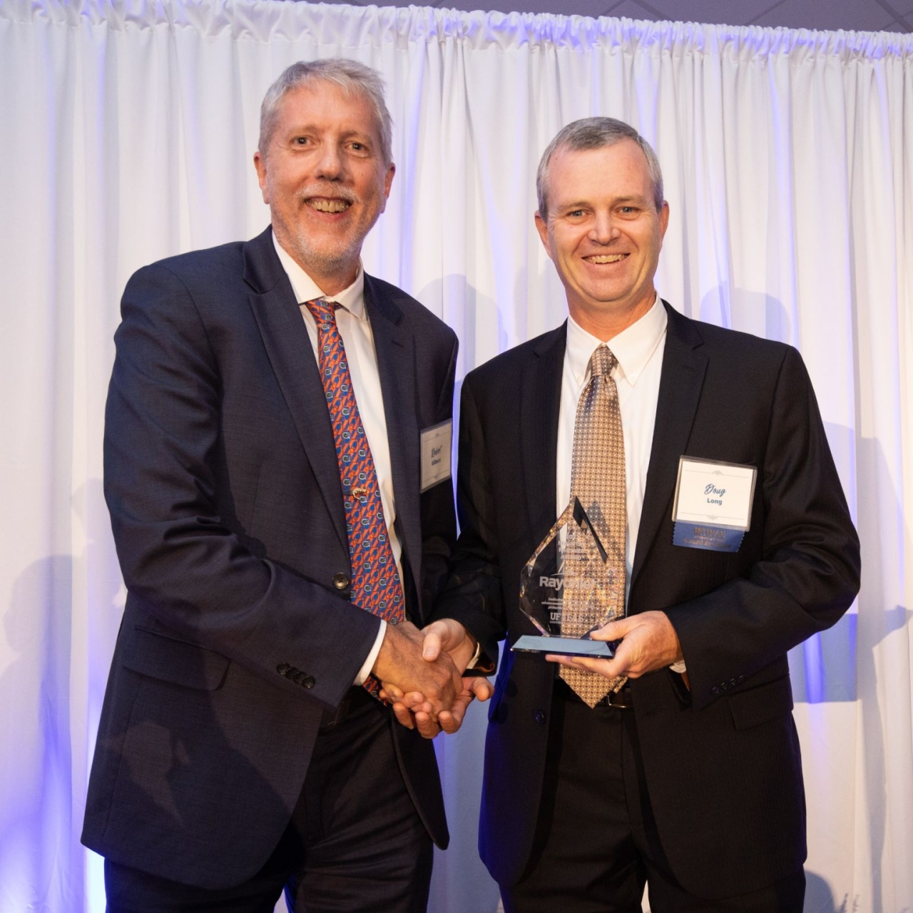 Senior Vice President Doug Long, a UF graduate, received the award on Rayonier's behalf.
