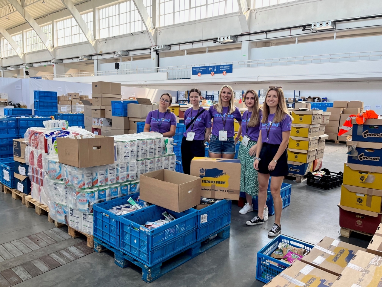 volunteer group in a warehouse