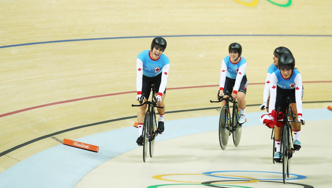 olympic bicyclists on track