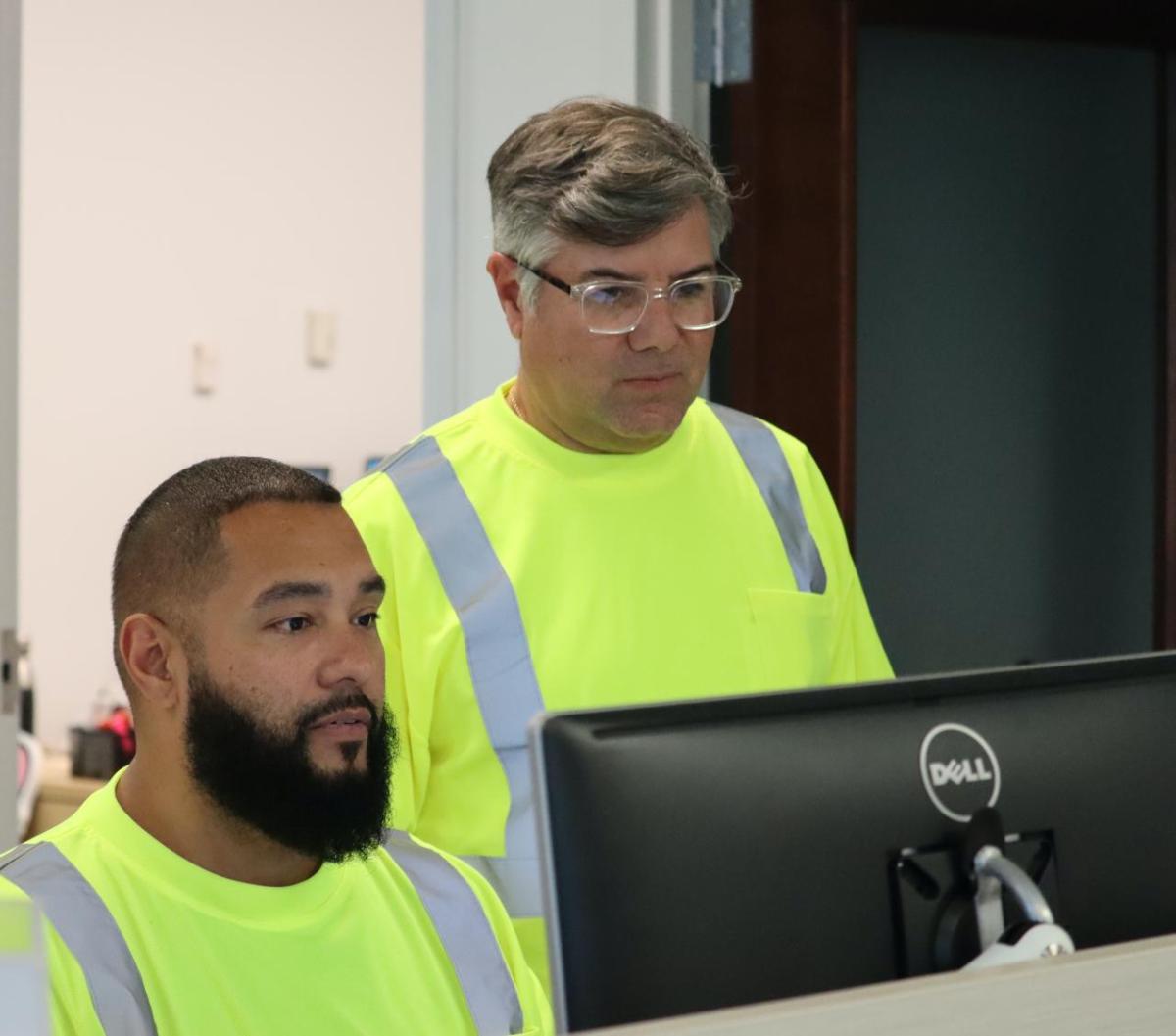 Covia employees Vincent and Rick working on the computer