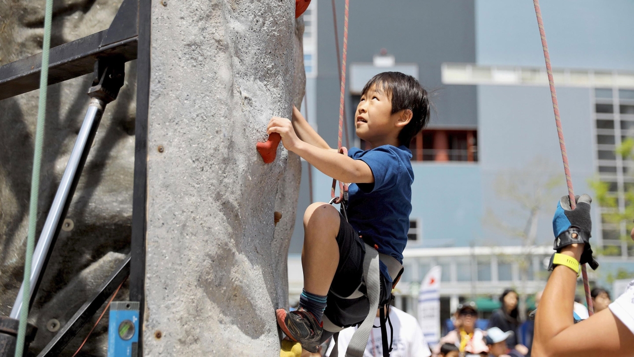 Child climbing rockwall