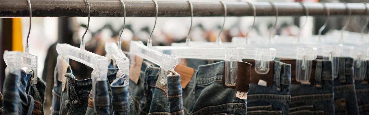 jeans hanging on a rack