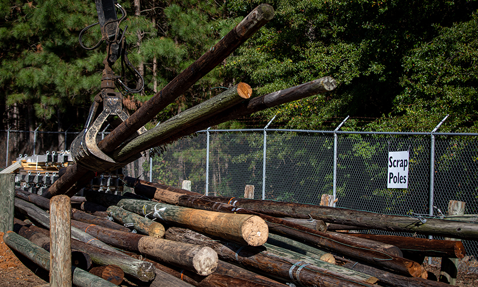 pile of old power poles