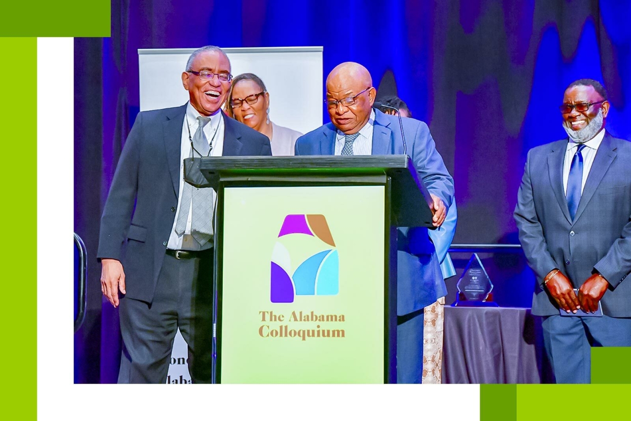 John Lewis' family on stage behind a podium 