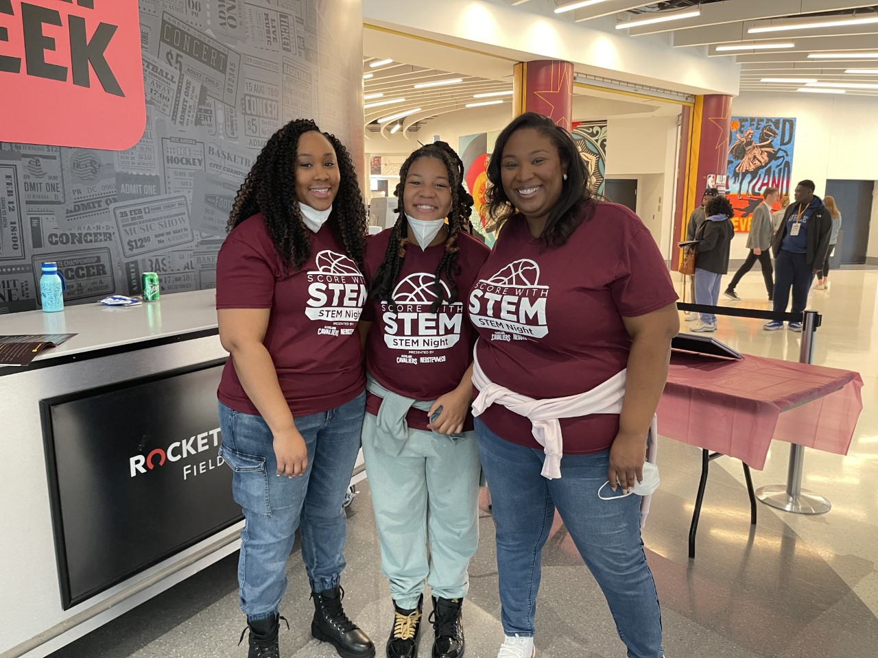 (L-R): Rockwell’s Dominique Roberts volunteered with her niece and sister.  