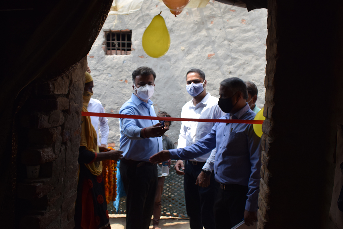 Rockwell’s Chitrabhanu Ghosh, assistant general counsel (center left), and Ankit Singh, India EHS lead, (center right), at one of the home launch ceremonies.