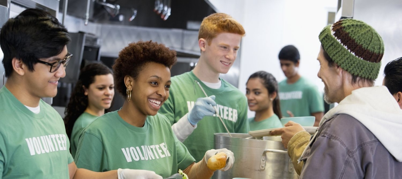 Volunteers serving food