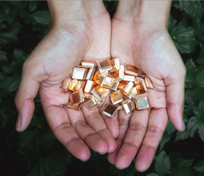 Cupped hands holding Impact Gold, a fully traceable gold artisanally mined in Peru by PX IMPACT® which created a sustainable, transparent supply chain that meets world leading standards for responsible practices through guaranteeing: Image: B.P. de Silva. https://bpdesilvajewellers.com/blogs/safekeeping-stories/introducing-impact-gold