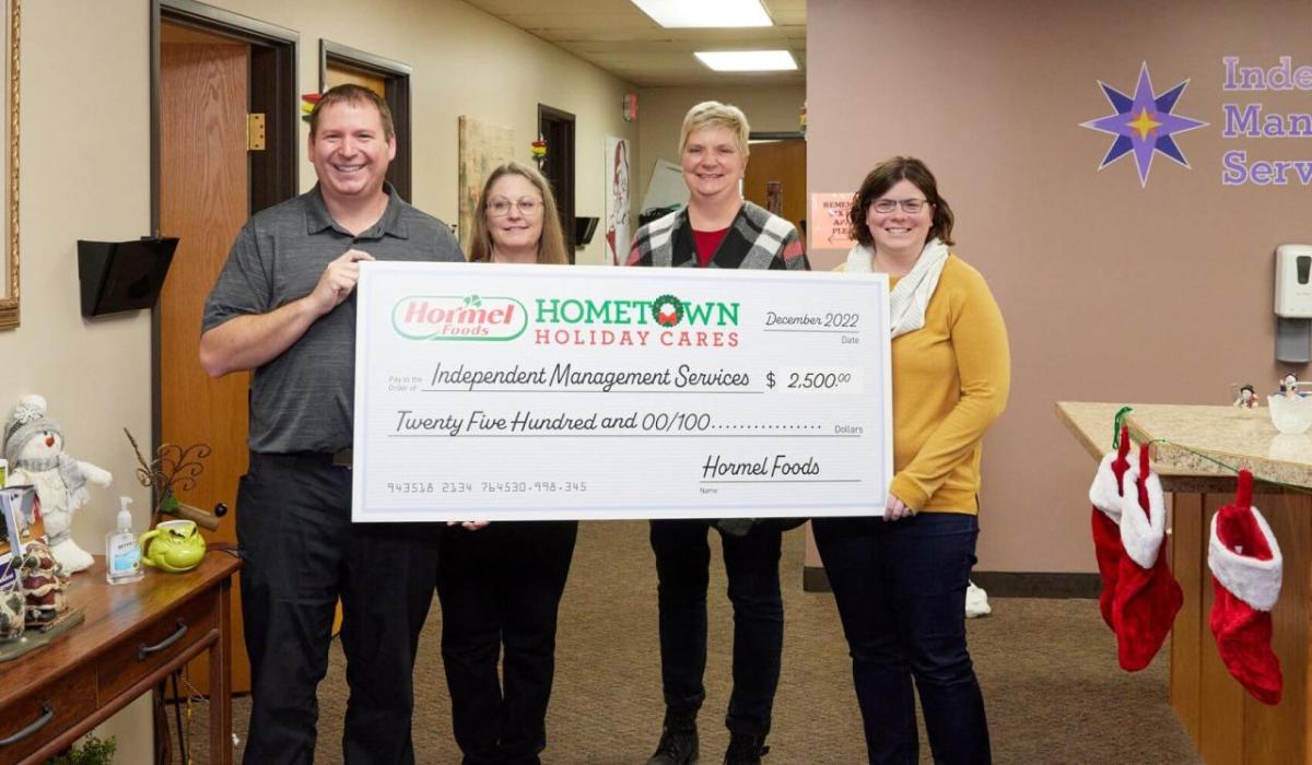 Independent Management Services oversized check presentation