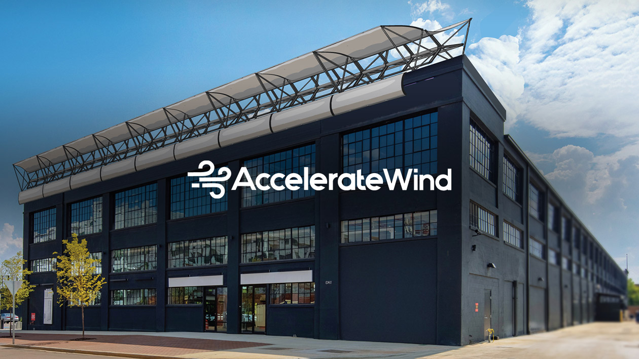 AccelerateWind logo with building in the background