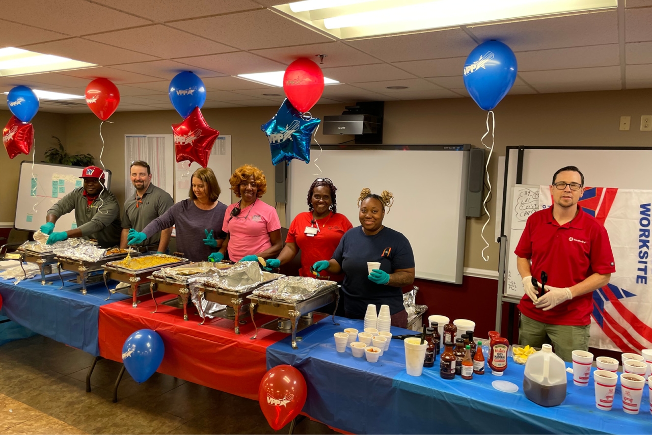 employees at Southwire celebrate with a buffet of food