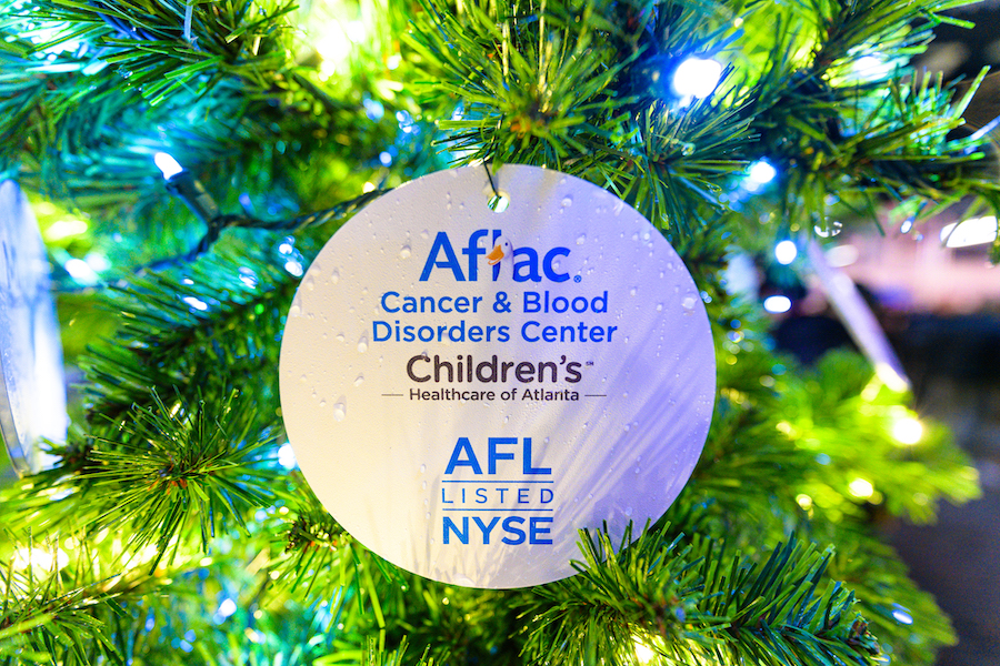 Aflac ornament shown on a Christmas tree. 
