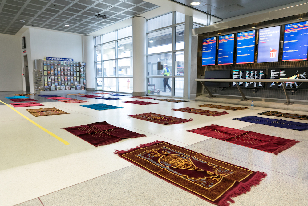 prayer mats in an airport