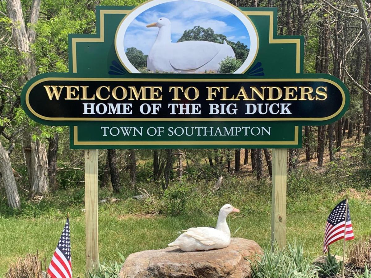 Welcome to Flanders; Home of the Big Duck sign.