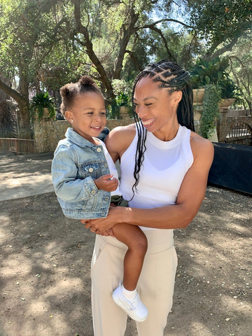 Allyson Felix with child