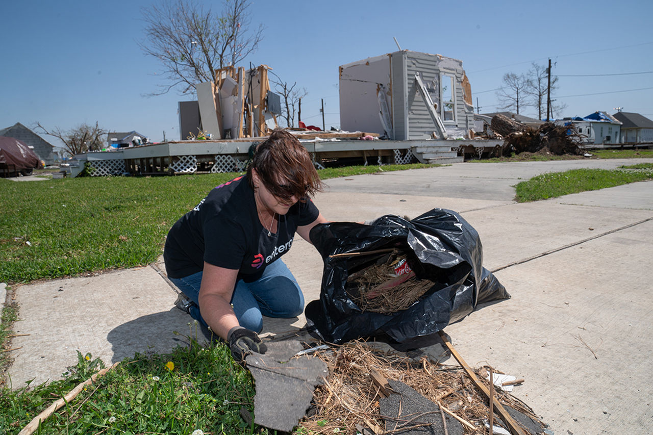 volunteer picking up trash