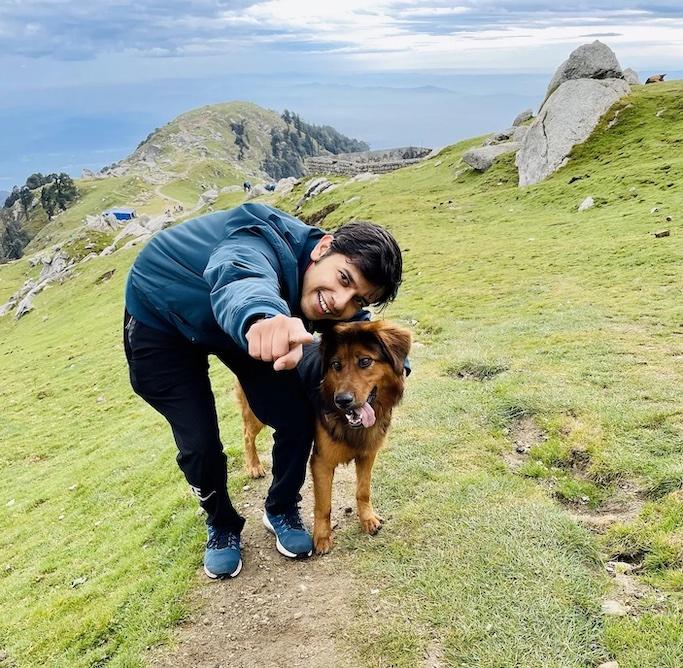 Arpan Gupta with his dog on a hike.