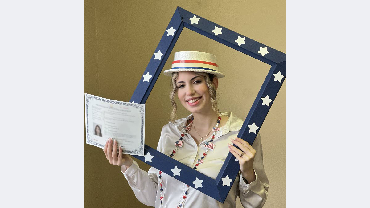 Camila Asenjo Perez celebrating her citizenship.