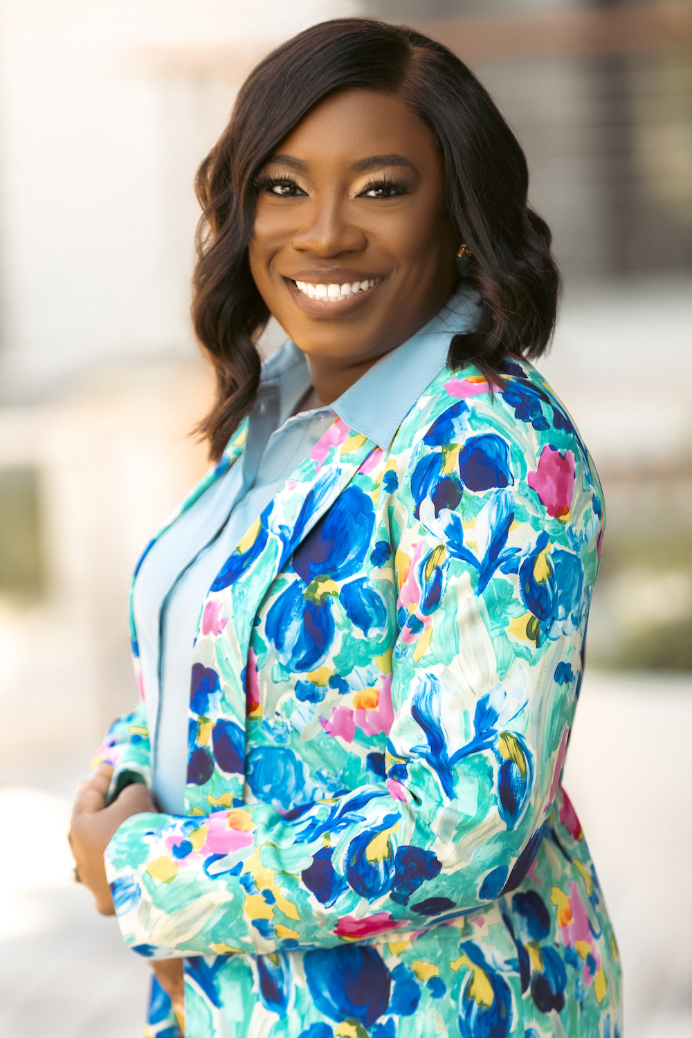 Chiquita Hall-Jackson smiles at the camera - attorney, employment law expert and inclusion advocate