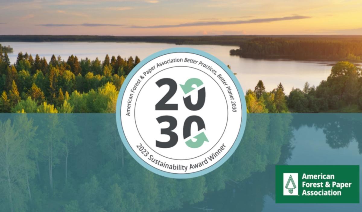 Over an aerial landscape of a lush forest and waterway, "2030 2023 Sustainability Award Winner" logo.