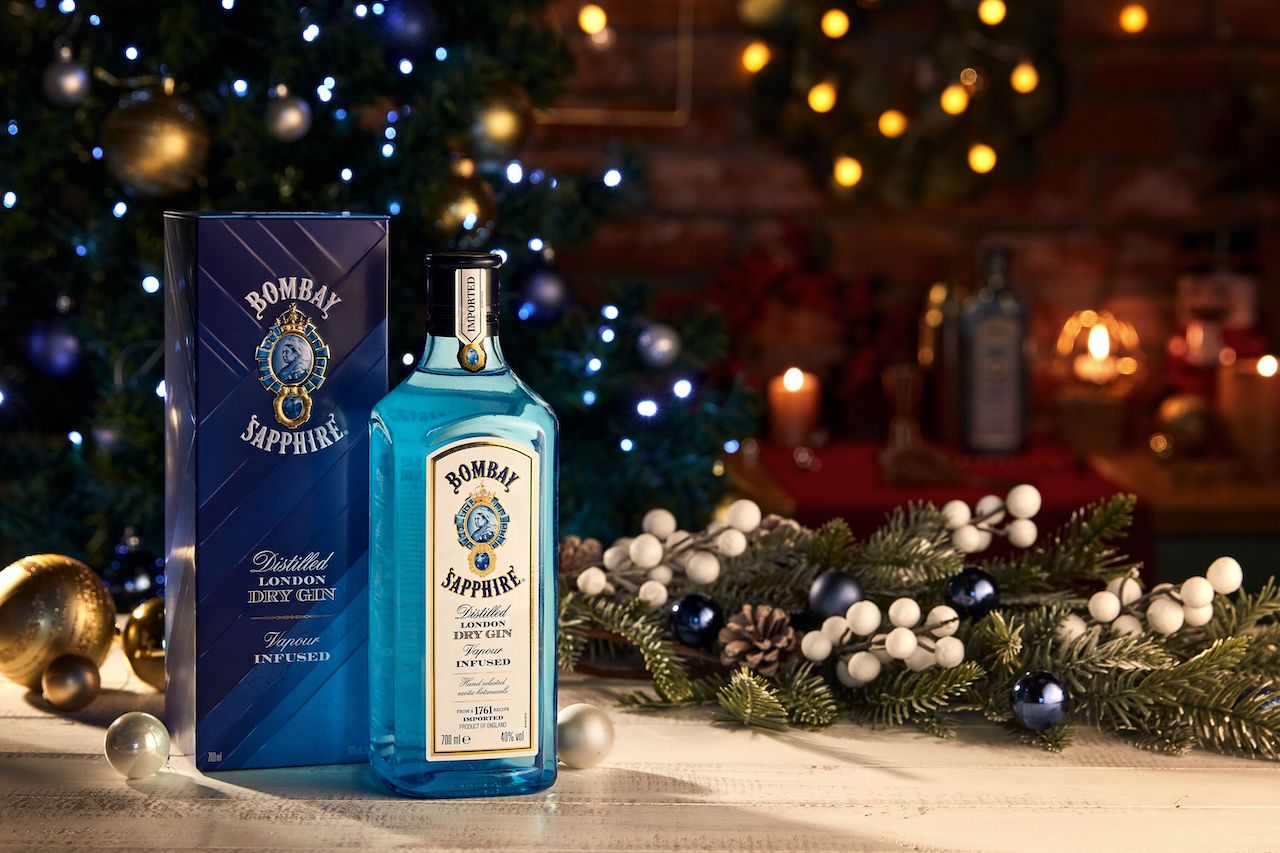 Bombay Sapphire box and bottle in front of holiday decor