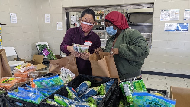 2 people sorting food