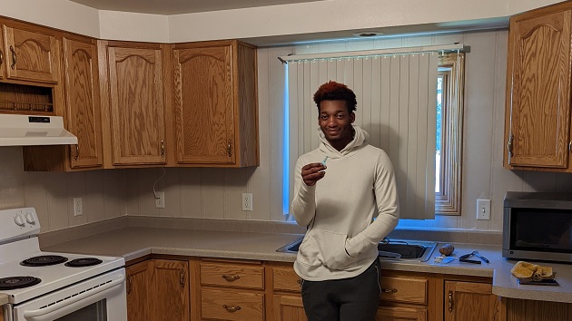 A Workforce Resources client in Wisconsin proudly displays the key to his first apartment.