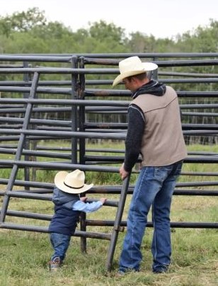 Father and child on farm