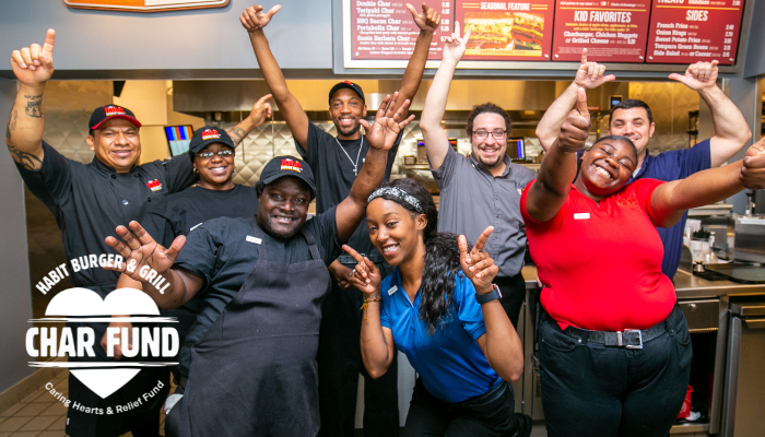 Group photos of smiling workers at Habit Burger & Grill 