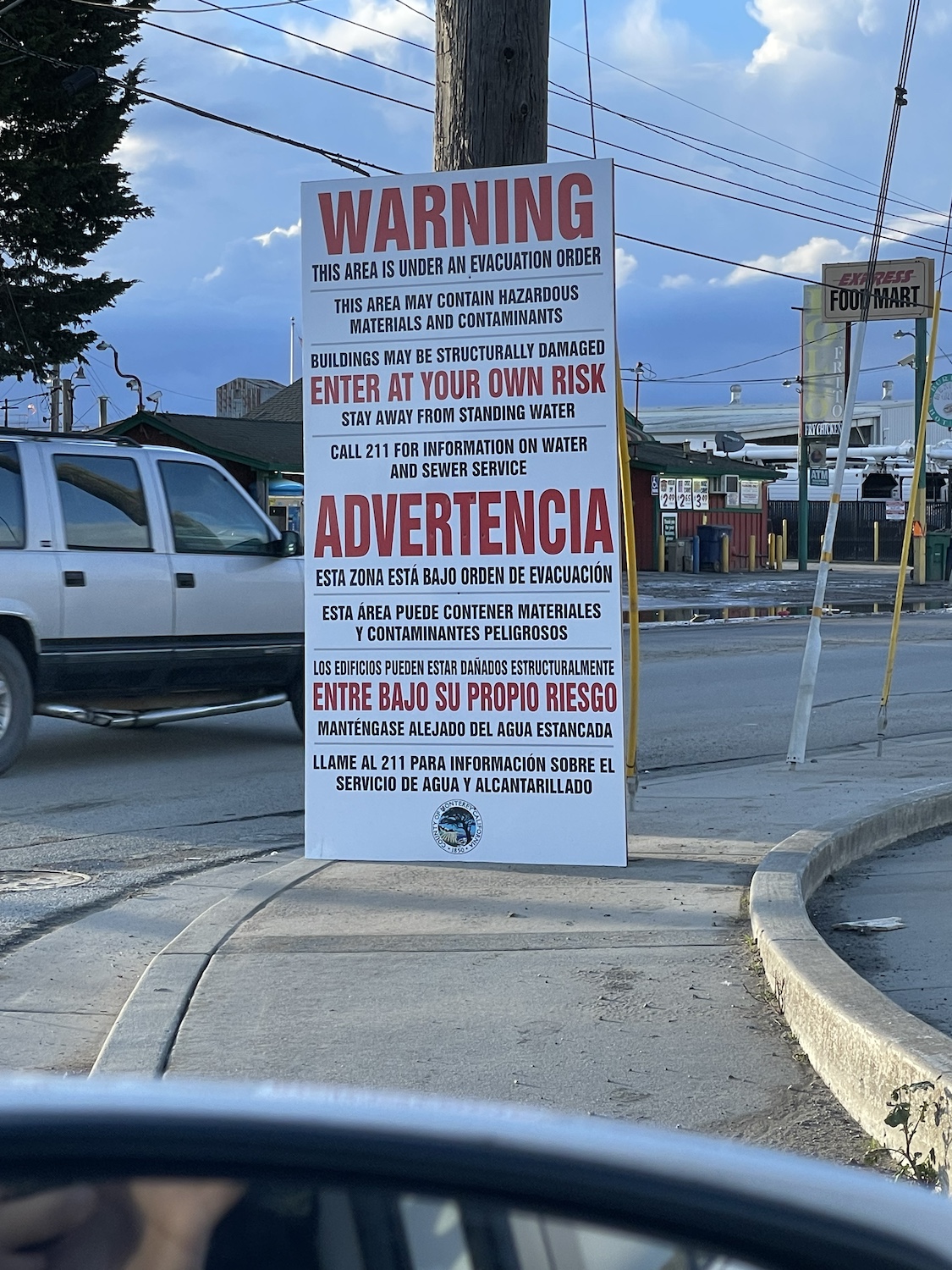 An evacuation warning sign put up in Pajaro, California, because of the flooding — disaster recovery