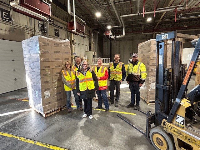 Group photo in warehouse