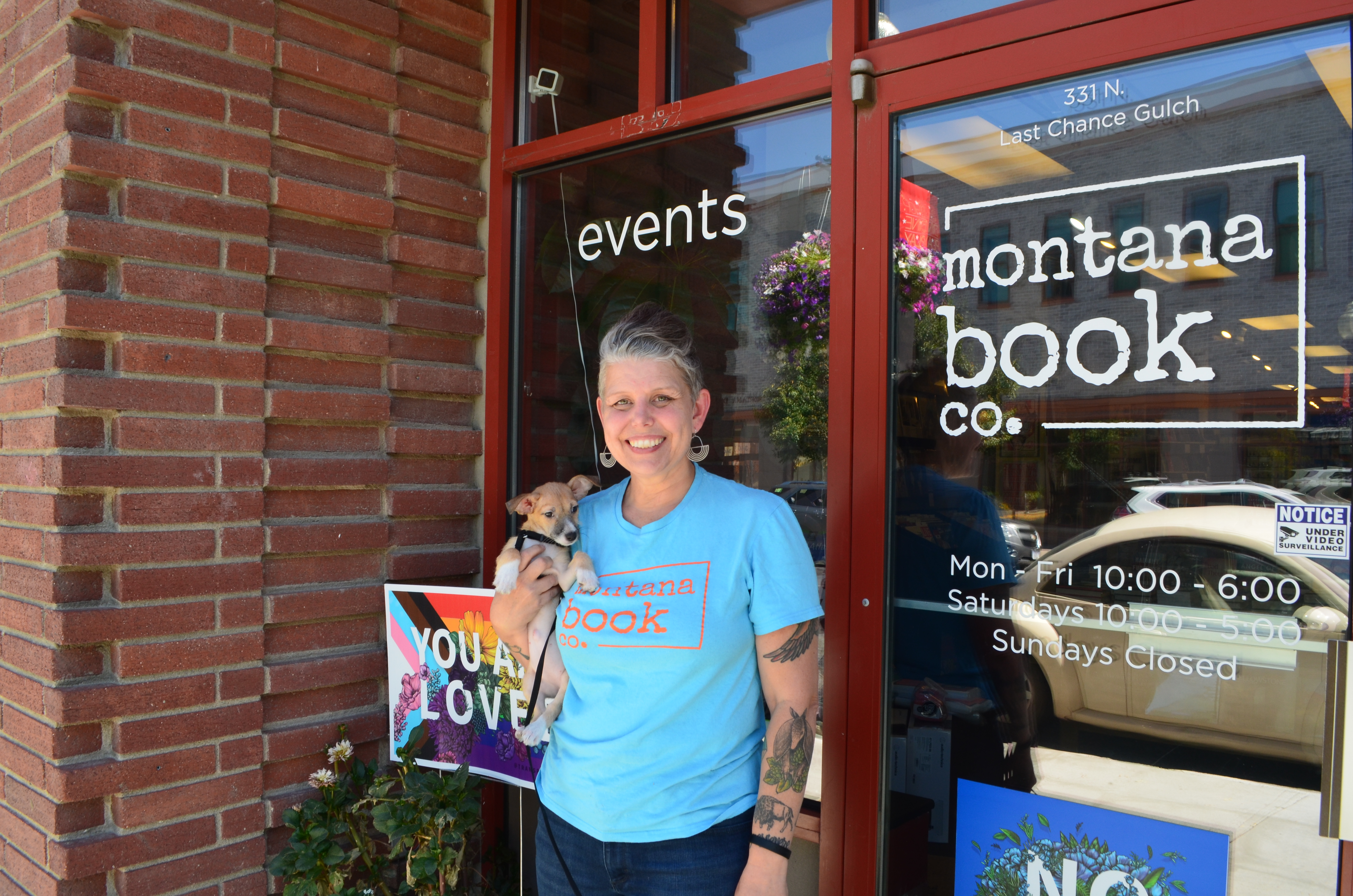 Chelsia Rice, co-owner of Montana Book Company, with Cricket