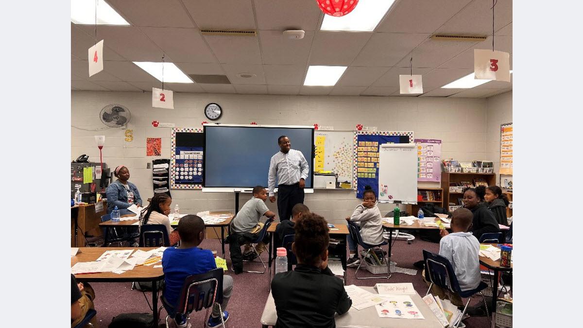 A U.S. Bank volunteer leading a discussion on financial education at Martin Luther King Elementary in Little Rock, Arkansas.