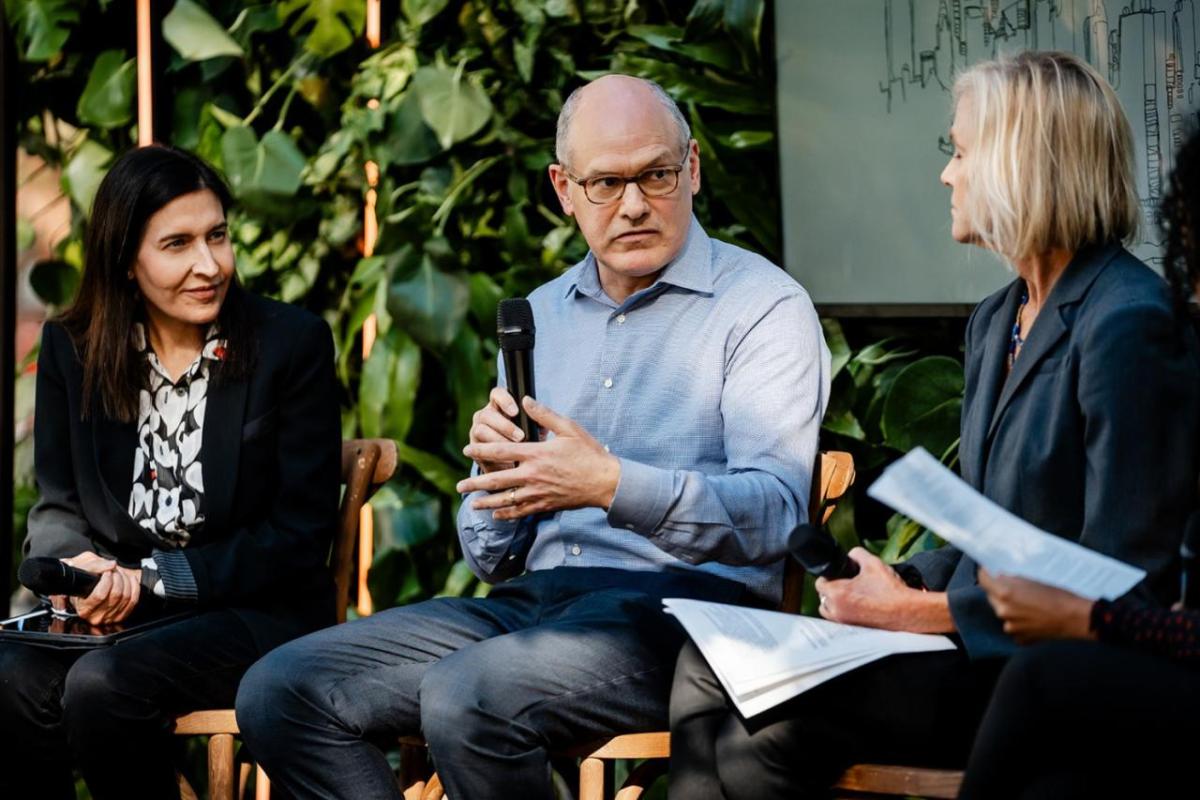 Three people talking together