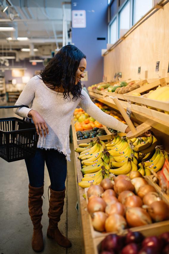 Woman shops for Fairtrade certified bananas