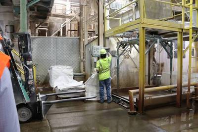 worker inside Covia plant