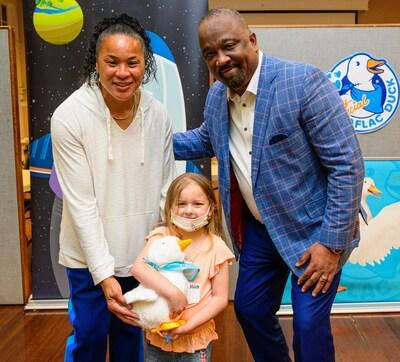 South Carolina women’s basketball head coach Dawn Staley and Aflac U.S. President Virgil Miller deliver My Special Aflac Duck to cancer and sickle cell disease patients at UVA Children's in Charlottesville, Virginia.