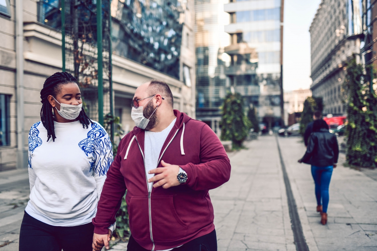 Couple holding hands and smiling