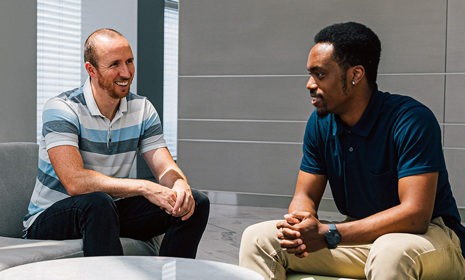 Jordan Howard, right, and his supervisor at Duke Energy, Daniel McIntyre.